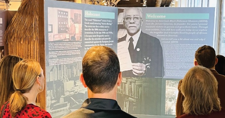visitors viewing exhibits at America's Black Holocaust Museum