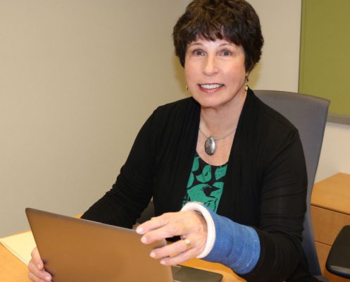 Dr. Rita at Network Health in office