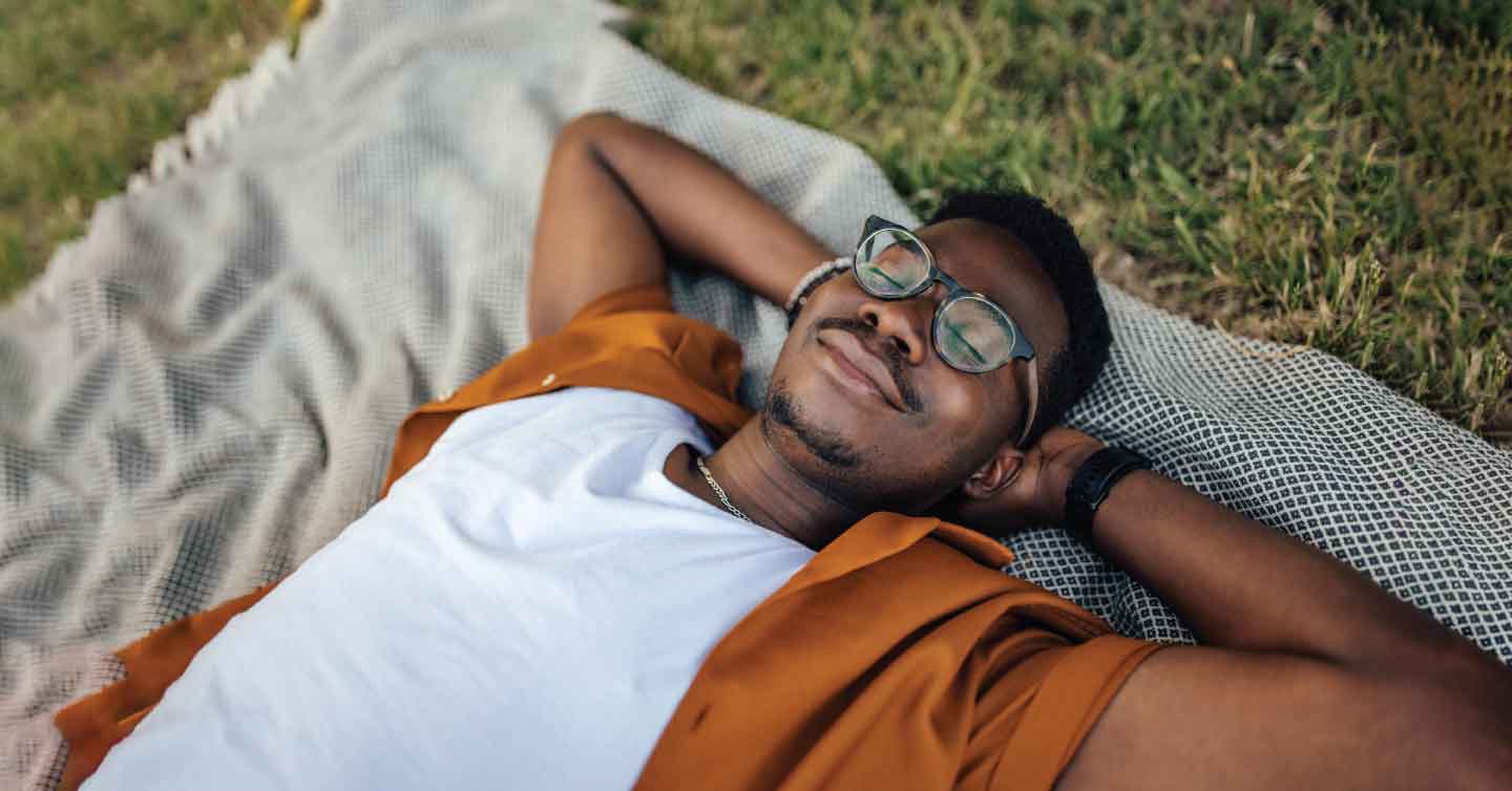 a person relaxing for their mental health on their day off work