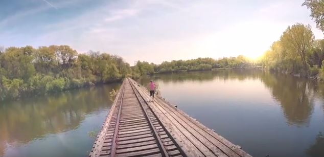 Runner on bridge