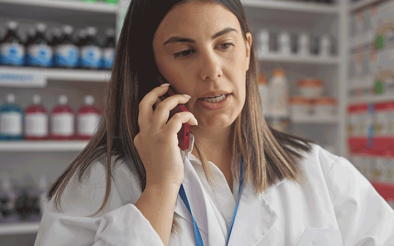 pharmacist-using-telephone.png
