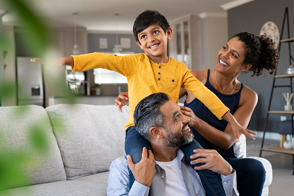 young-family-playing-living-room.jpg