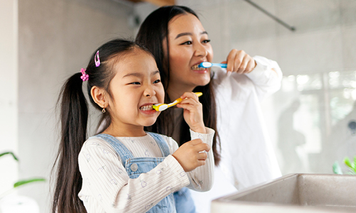 two-people-brushing-teeth.jpg